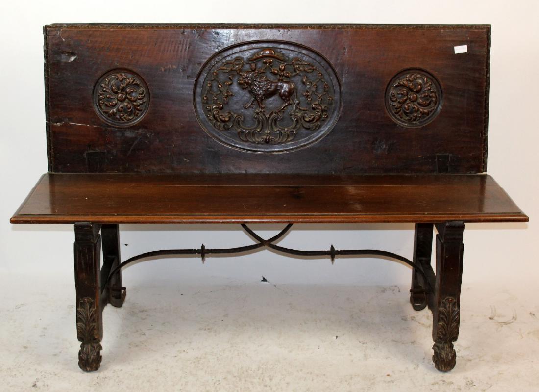 Carved Spanish banquette in walnut with iron stretcher (1 of 6)