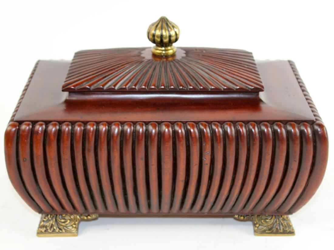 Carved mahogany lidded box on feet: Carved mahogany lidded box on feet. 9"h x 13 1/2"w x 8 1/2"d