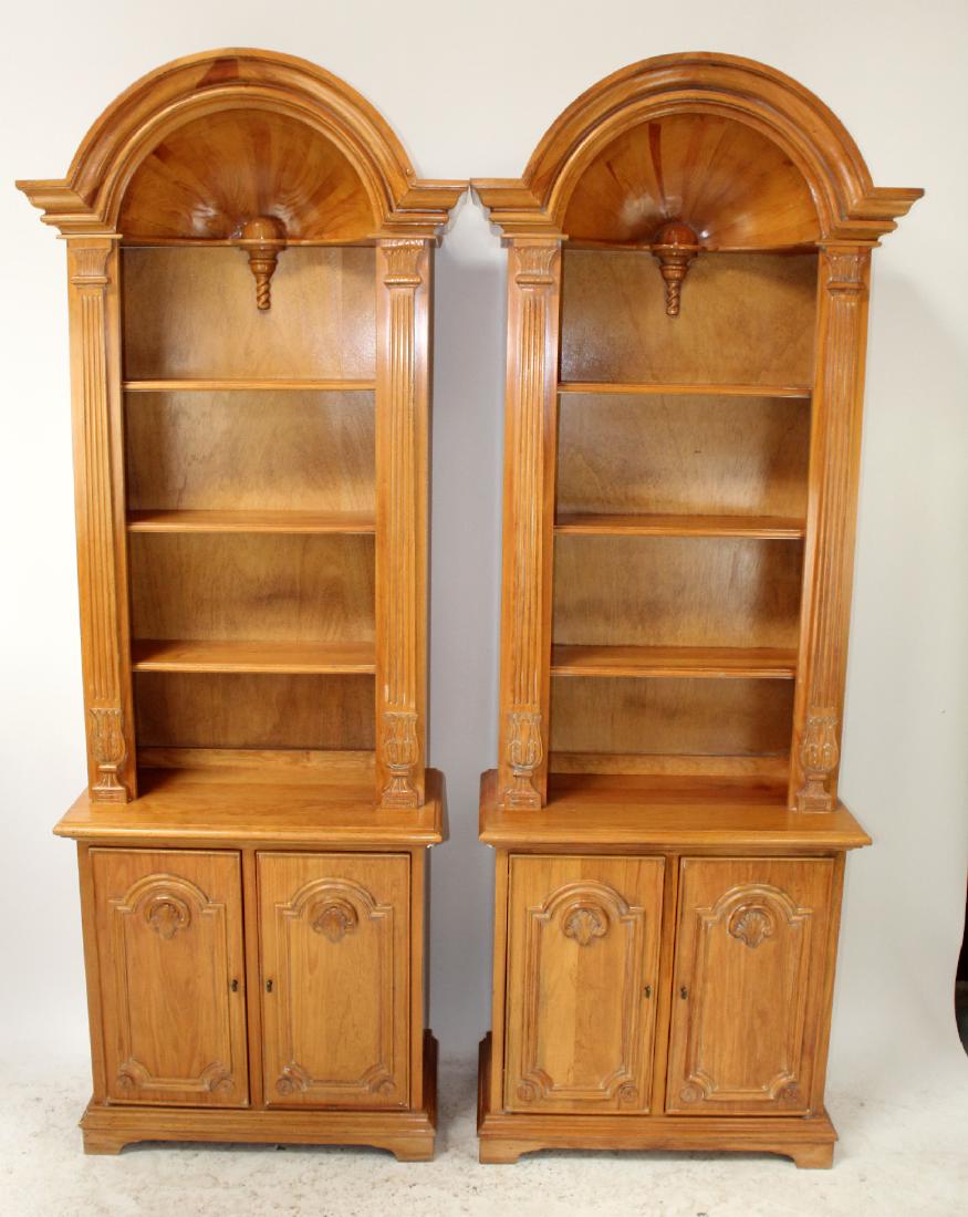 Pair of oak open bookcases with shell carvings (1 of 4)