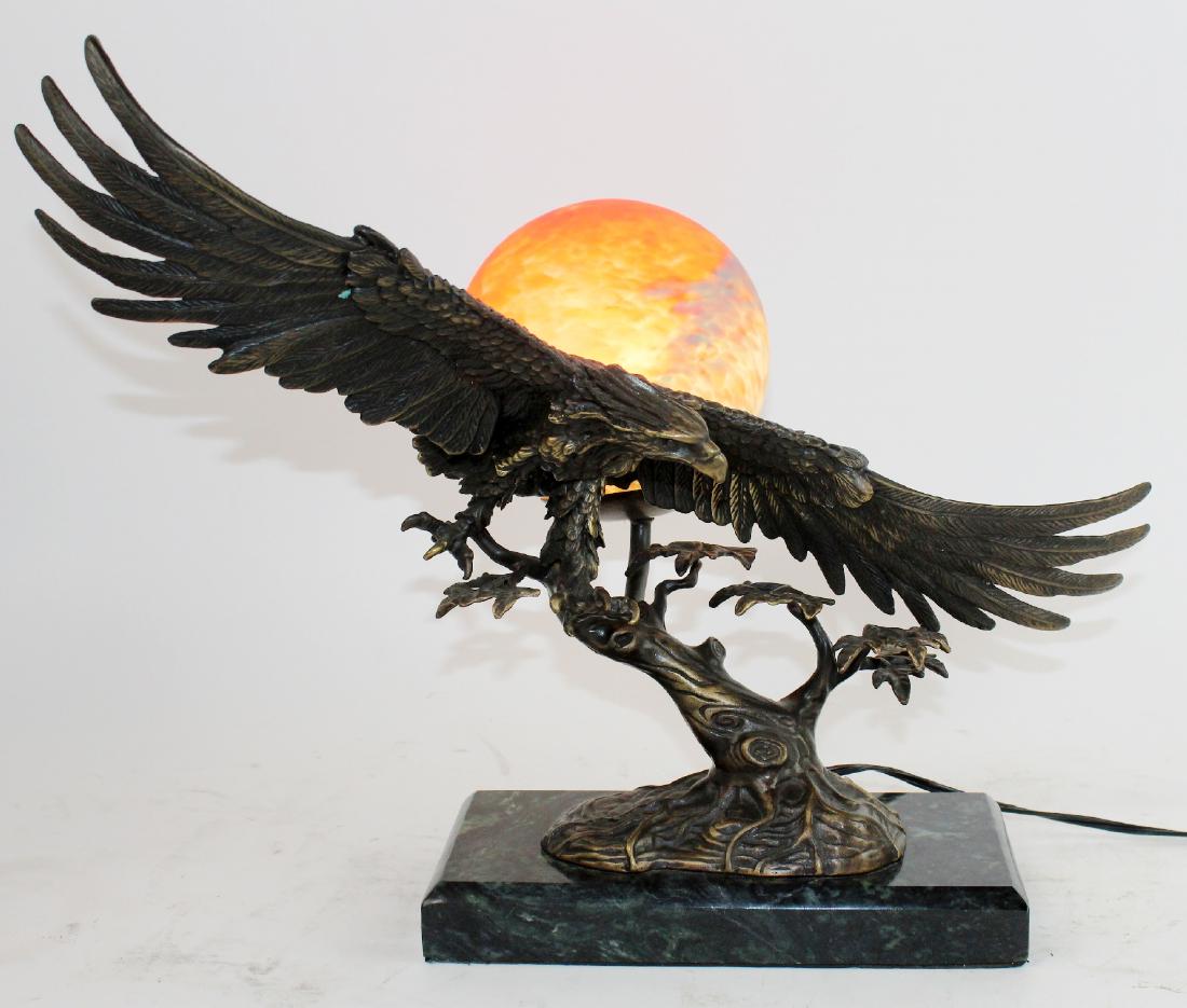 Bronze eagle lamp with art glass shade