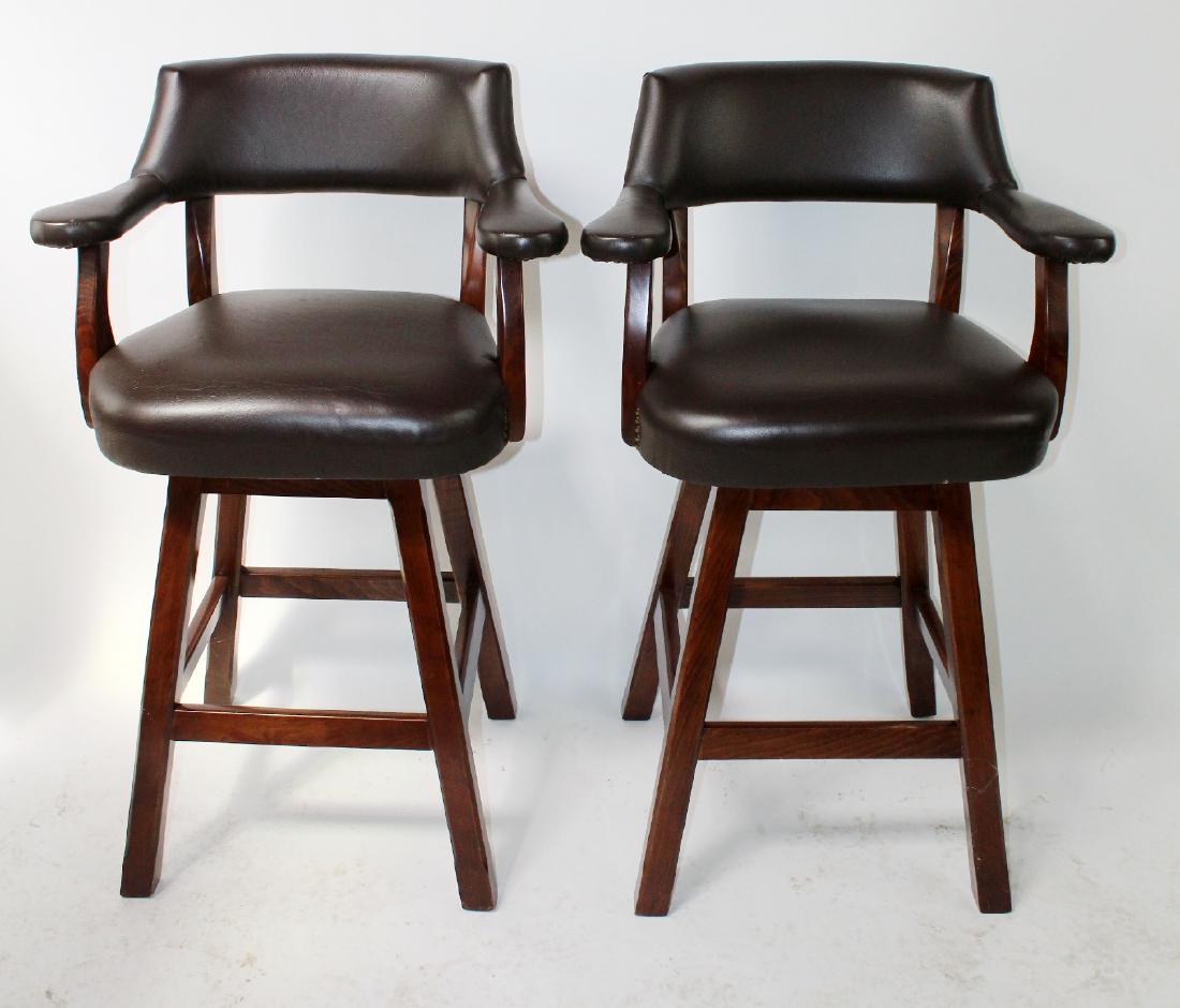Pair leather captain's style swivel bar stools (1 of 7)