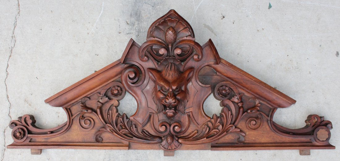 French carved walnut overdoor/crown with face.: French carved walnut overdoor/crown with focal face. 20"h x 44"w