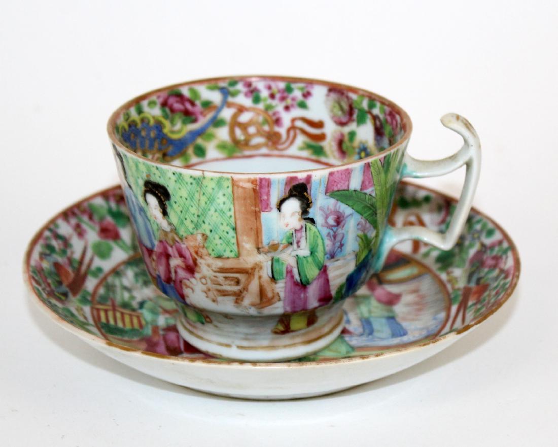 Chinese Famille rose porcelain cup and saucer: Chinese famille rose porcelain tea cup and saucer. Tea cup measures 2 1/2"h and saucer measures 5 3/4" dia