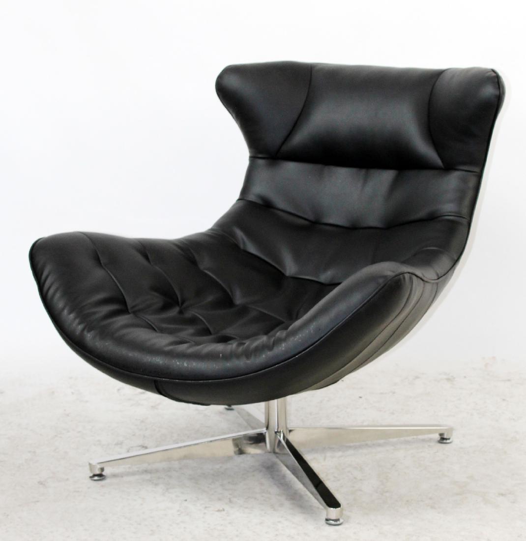 Lounge chair after Arne Jacobsen: Lounge chair in the manner of Arne Jacobsen. 21st century. 33"h x 33 1/2"w x 37"d