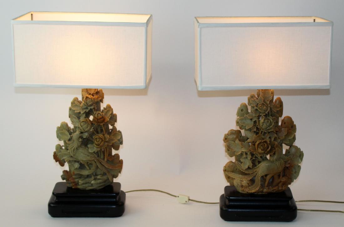 Pair of Chinese carved soapstone lamps: Pair of Chinese carved soapstone lamps on wooden bases. 22"h including the shade.