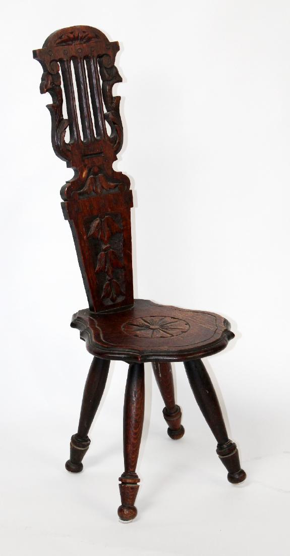 Oak milking stool with carved back support. (1 of 4)