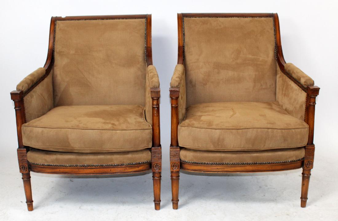 Pair French Heritage bergere chairs: A pair of French Heritage bergere chairs. Upholstered in ultra-suede. 35 1/2"h x 28"w