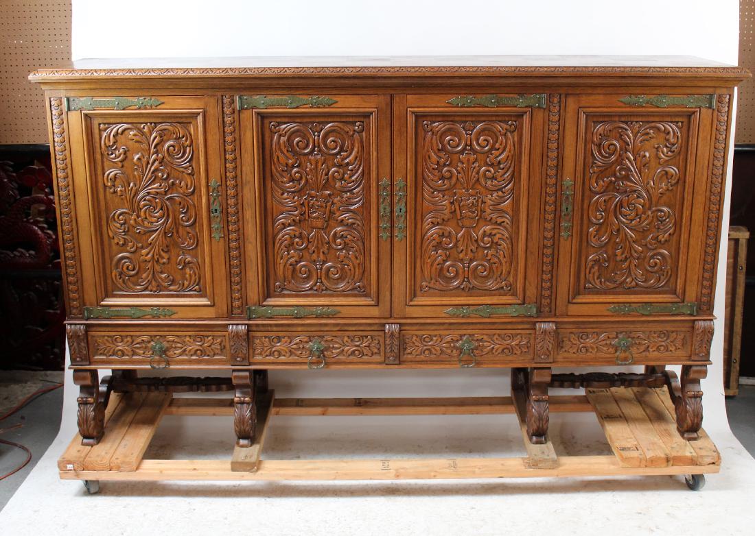 Renaissance style 4 door sideboard in oak (1 of 5)