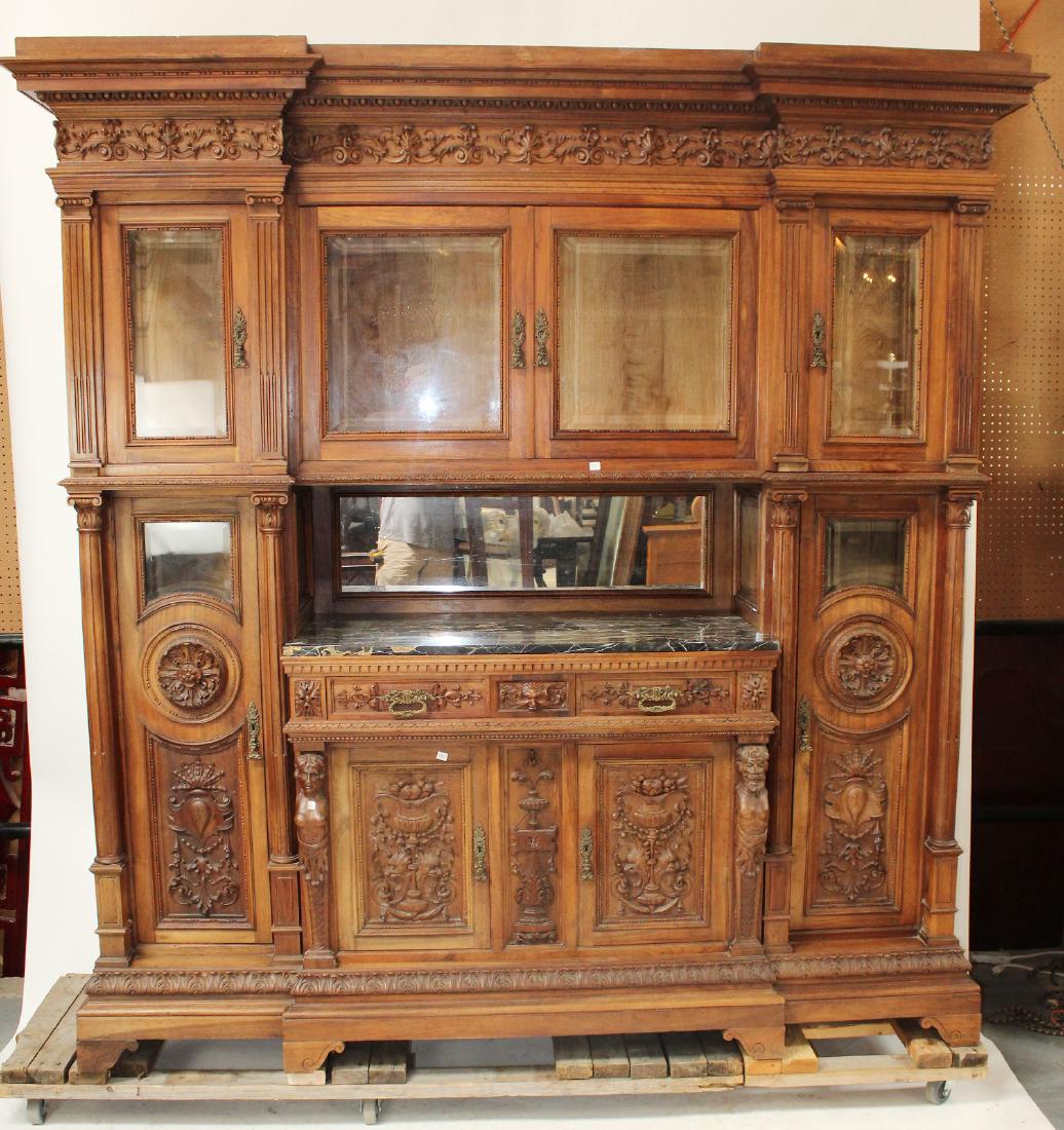 Italian Renaissance buffet with glass cabinets: Italian Renaissance buffet with figural mounts, portoro marble and beveled glass side cabinets. Late 19th century. 91"h x 86 1/2"w x 24 1/2"d