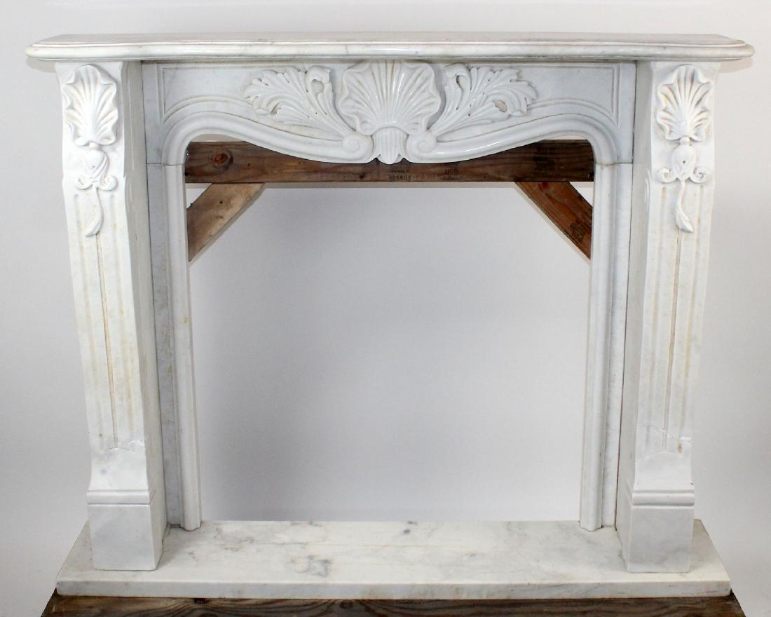 Carved white marble mantel with shell carving (1 of 6)