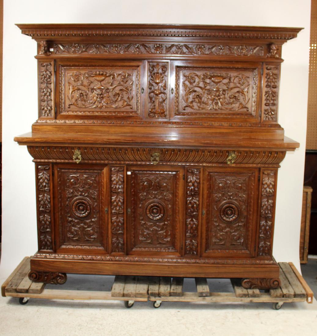 Italian Renaissance heavily carved buffet: Italian Renaissance heavily carved buffet with mythological masks. 2 doors over 3 doors. Late 19th century. 76"h x 79"l x 24"d