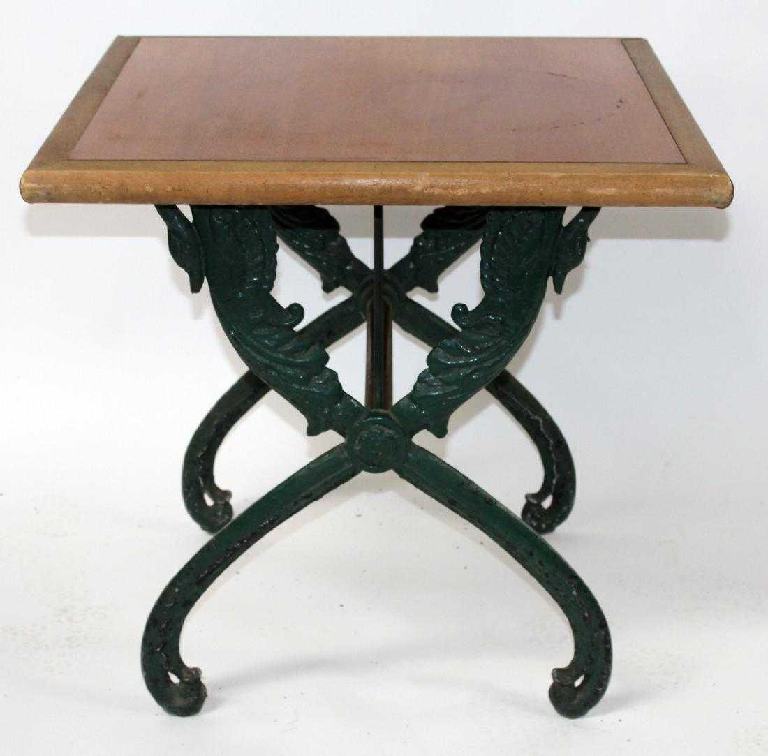 Antique cast iron bistro table with swans