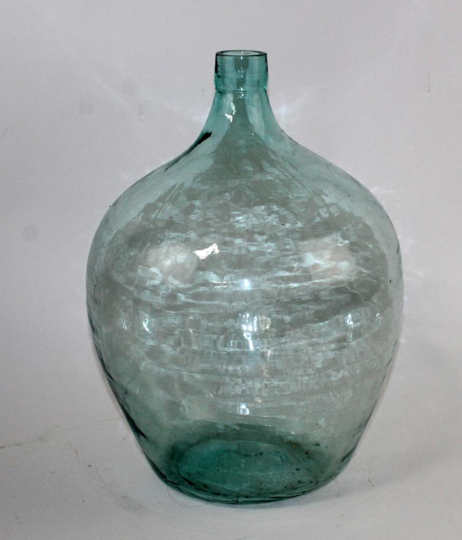 Large French glass demi john bottle