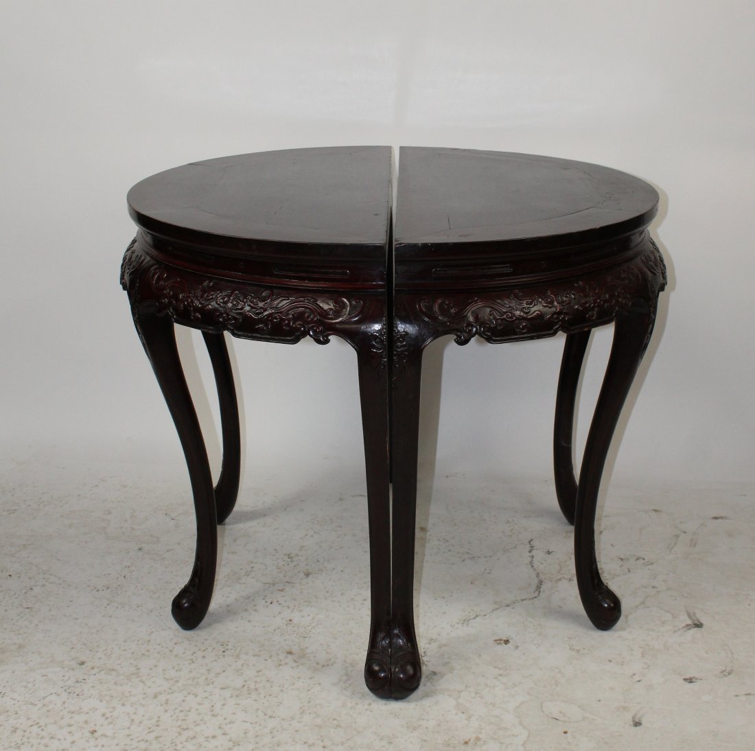 Pair of Chinese demi-lune console tables: A pair of Chinese demi-lune console tables. 32"h x 42"w x 21"d
