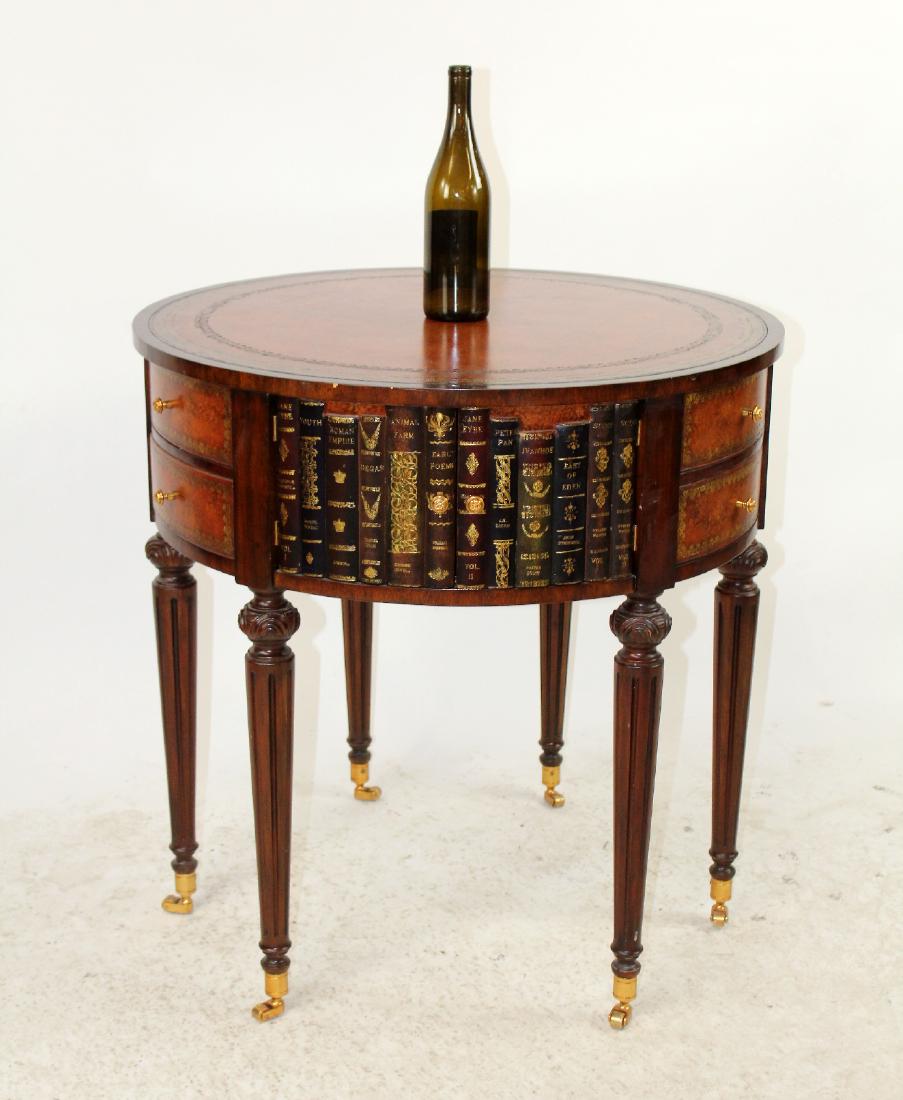 Maitland Smith tooled leather faux book library table: Maitland Smith Sheraton style tooled leather faux book round library side table. 30"h x 30"dia