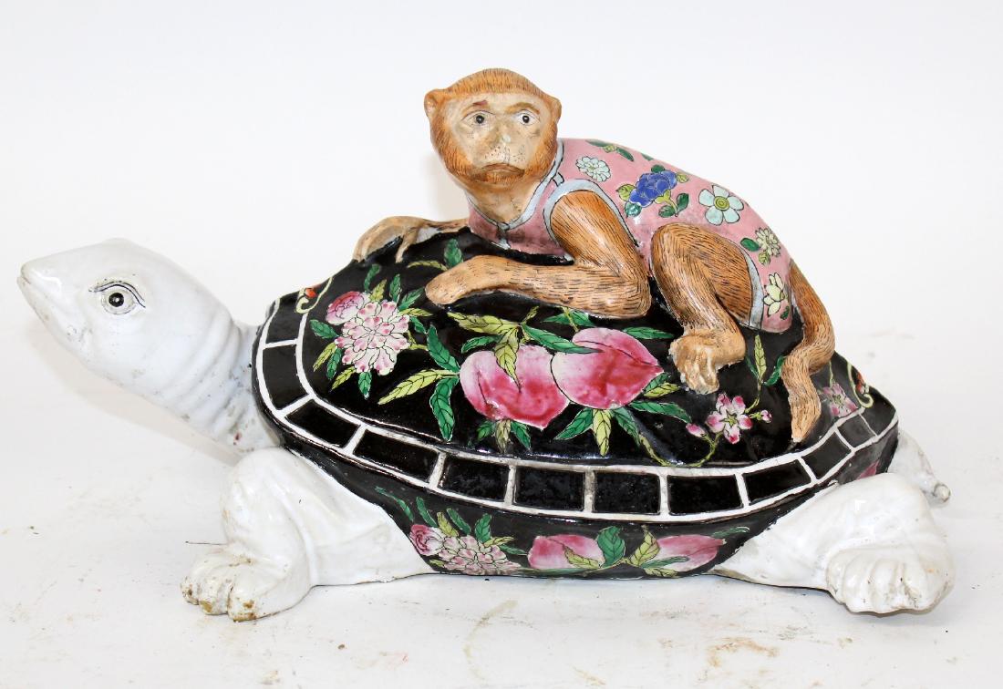 Chinese ceramic figurine monkey on turtle sculpture (1 of 8)