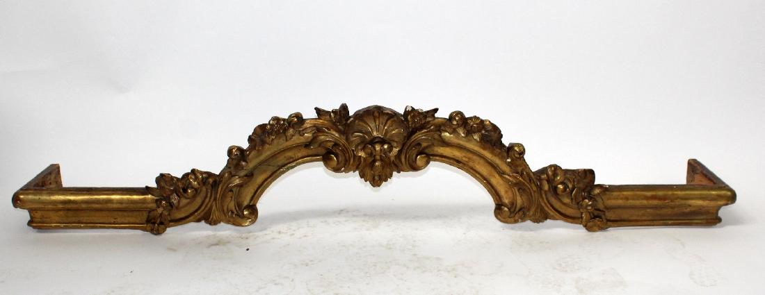 French Louis XV gold leaf valence or overdoor: French Louis XV gold leaf window valence or overdoor with rocaille shell & floral detail. Late 19th century. 12 1/2"h x 66 1/2"w