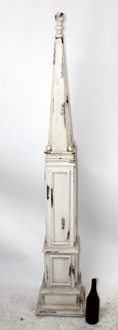 Distressed painted obelisk: Distressed painted obelisk with ball. 68"h x 12"square