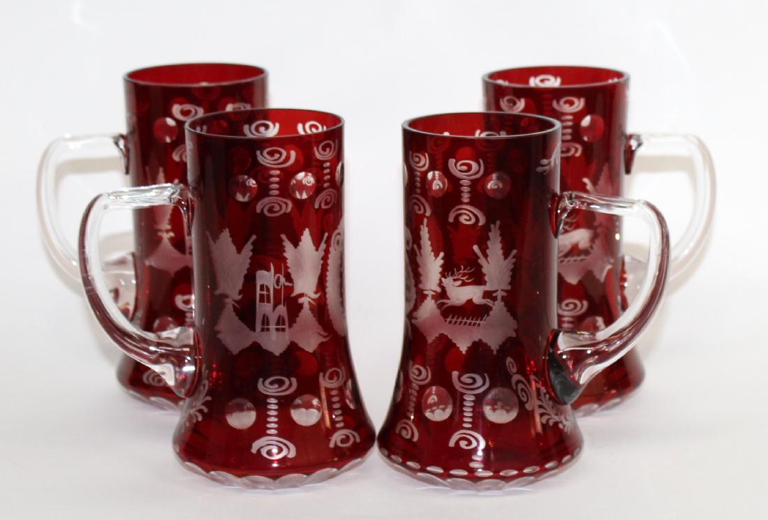 Set of 4 cranberry cut to clear crystal mugs: Set of 4 Egermann Czech cranberry cut to clear crystal mugs. 6 3/4"h