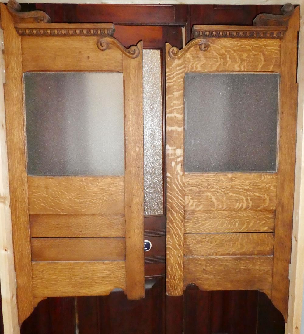 Pair Brunswick tiger oak swinging saloon doors: Pair Brunswick tiger oak swinging saloon doors. 58"h x 23"w each door