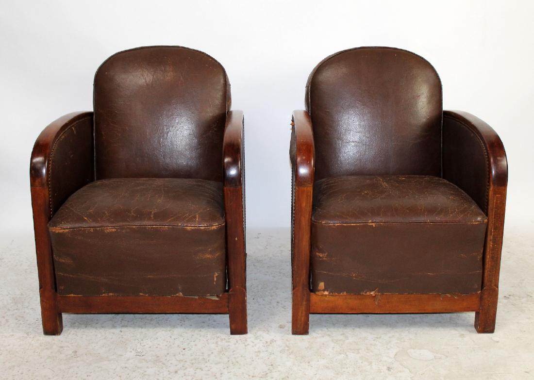 Pair French Art Deco leather club chairs: Pair French Art Deco reclining club chairs. Circa 1930. 31"h x 25"w