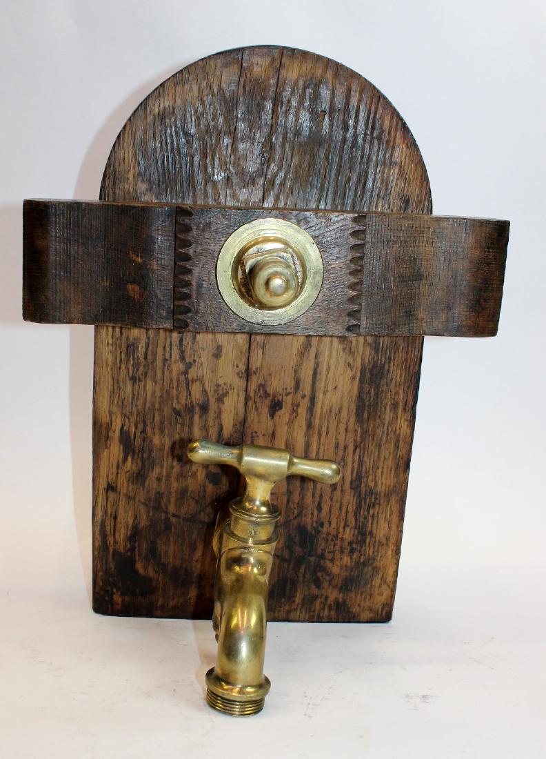 French winemaker's barrel tasting door: French winemaker's barrel tasting door with bronze tap. 18"h x 9"w