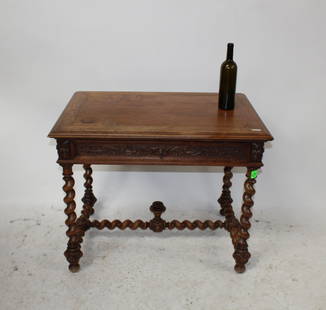 French carved walnut bureauplat desk with barley twist: French carved walnut small bureauplat desk with drawer. On barley twist legs and stretcher. Late 19th century. 28"h x 35 1/4"w x 24 1/2"d