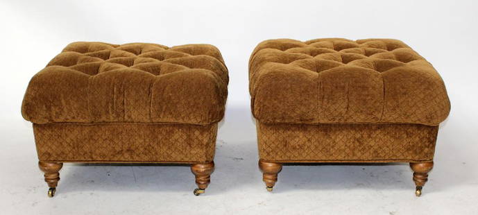 Pair of tufted ottomans: Pair of tufted ottomans on turned legs with casters. 18 /2"h x 27" sq