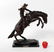 Bronze Bronco Buster sculpture after Remington