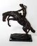 Bronze Bronco Buster sculpture after Remington - 5