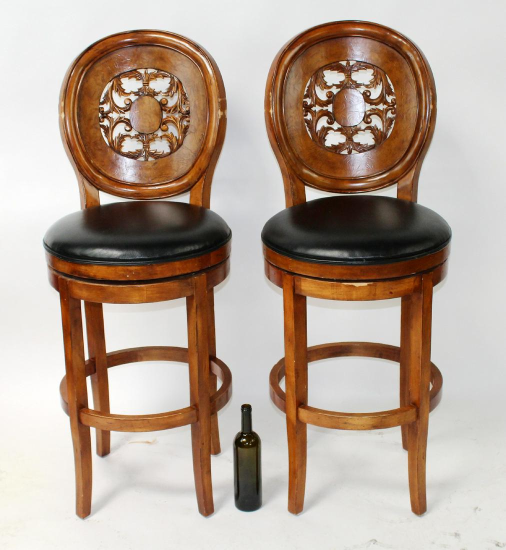 Pair of swivel pierce carved bar stools (1 of 8)