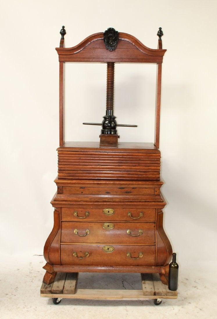 Dutch book press on bombe chest in oak (1 of 7)