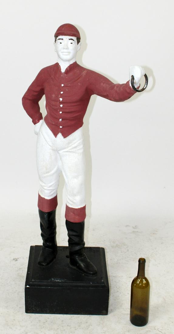 Antique White Oak Foundry iron lawn jockey: American cast iron lawn jockey. Circa 1900. Marked on base "White Oak Foundry Bacova Va. 46"h x 20"w x 16"d