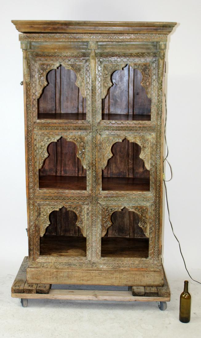 Balinese heavily carved bookcase in teak - Nov 02, 2019 | King