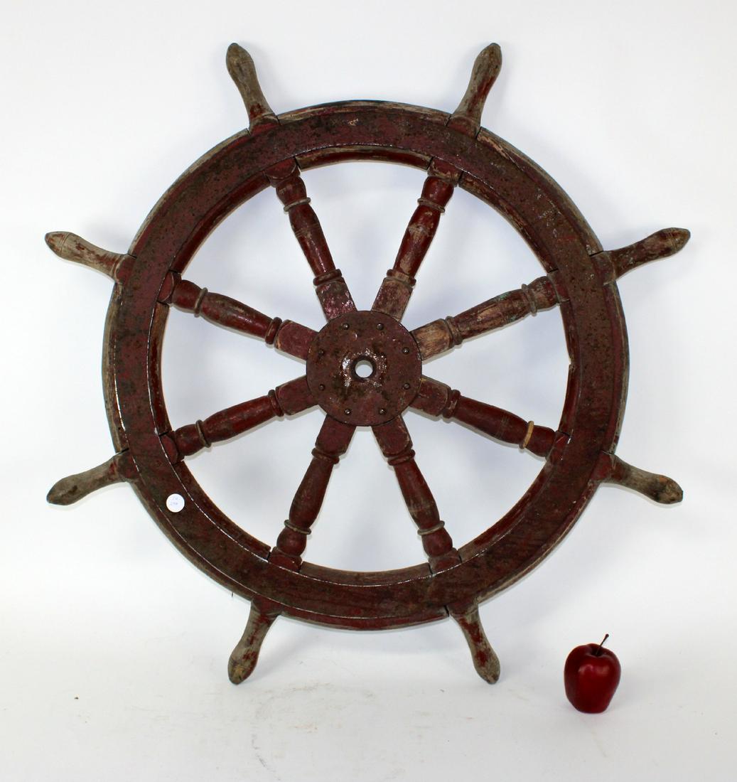 Painted wood and iron ships wheel: Painted wood and iron ships wheel. 20th century. 40"dia
