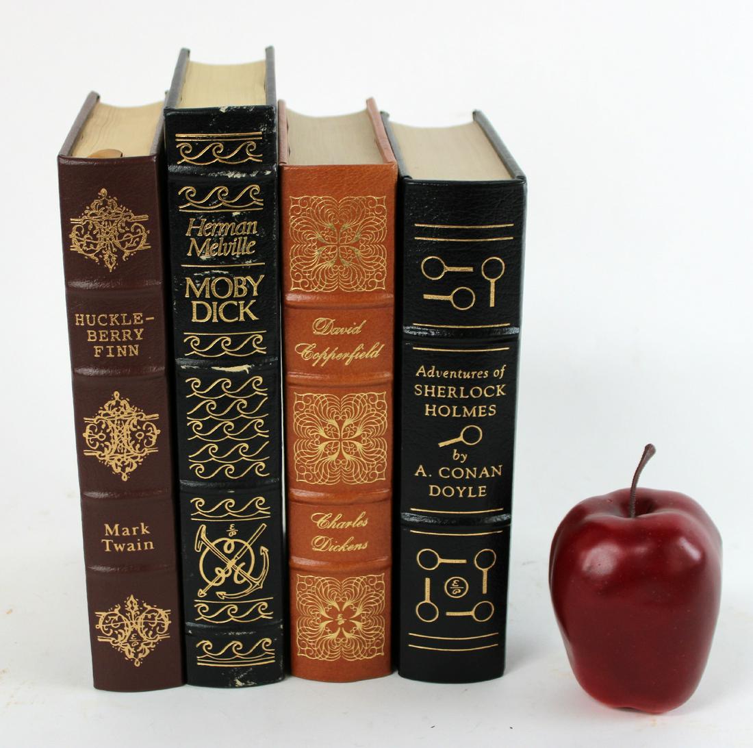 4 Easton Press leather bound classics books: 4 Easton Press leather bound classic books. Huckleberry Finn, Moby Dick, Sherlock Holmes, and David Copperfield. 9 1/4"h - 10 1/4"h