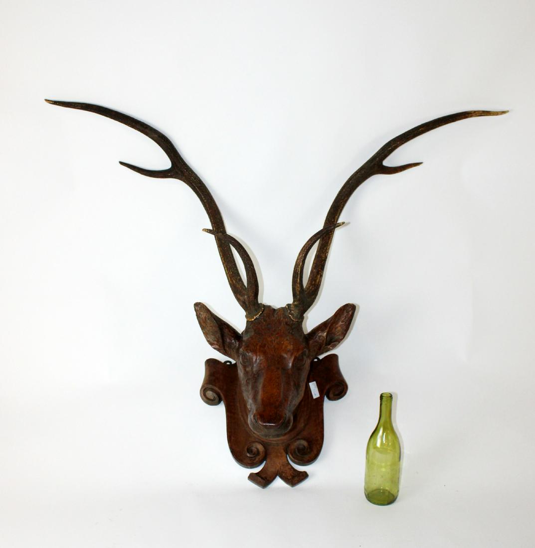 French carved deer head mount with organic antlers: French carved deer head mount with organic antlers . 37 1/2"h x 46 1/2"w x 12 1/2"d
