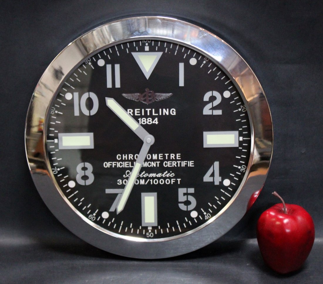 Breitling dealer advertising clock: Breitling dealer advertising clock "Chronometre Officiellemcnt Certifie". Battery operated movement. 13 3/8" dia