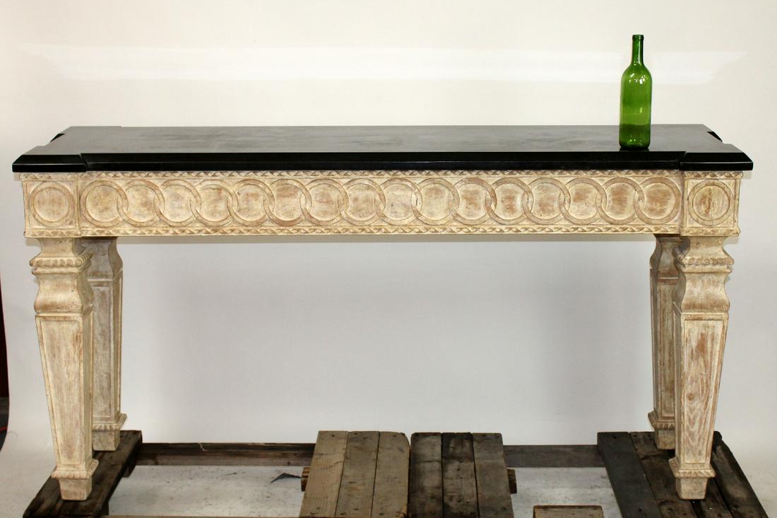 Distressed console table with marble top: Distressed carved console table on tapered legs with marble top. Late 20th century. 36 1/2"h x 70 1/4"W x 20 1/2"d