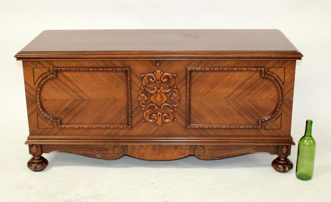 American Lane cedar lined chest: American Lane carved cedar lined chest on bun feet. Mid 20th century. 22 1/4"h x 49"w x 19 3/4"d
