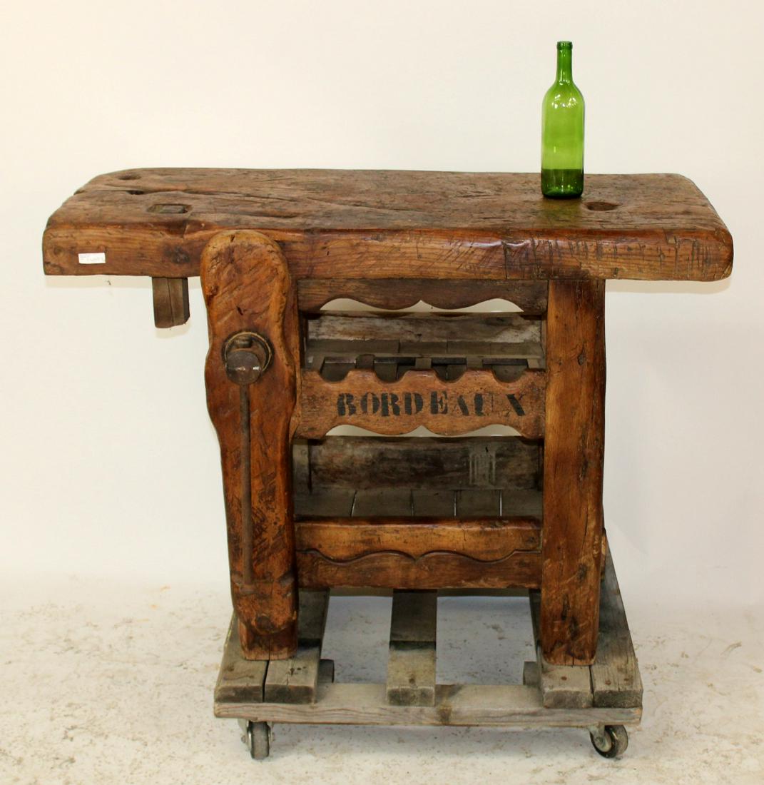 French carpenters bench wine console: French carpenter's bench mounted as wine console tasting table. 31 1/2"h x 46"w x 23"d