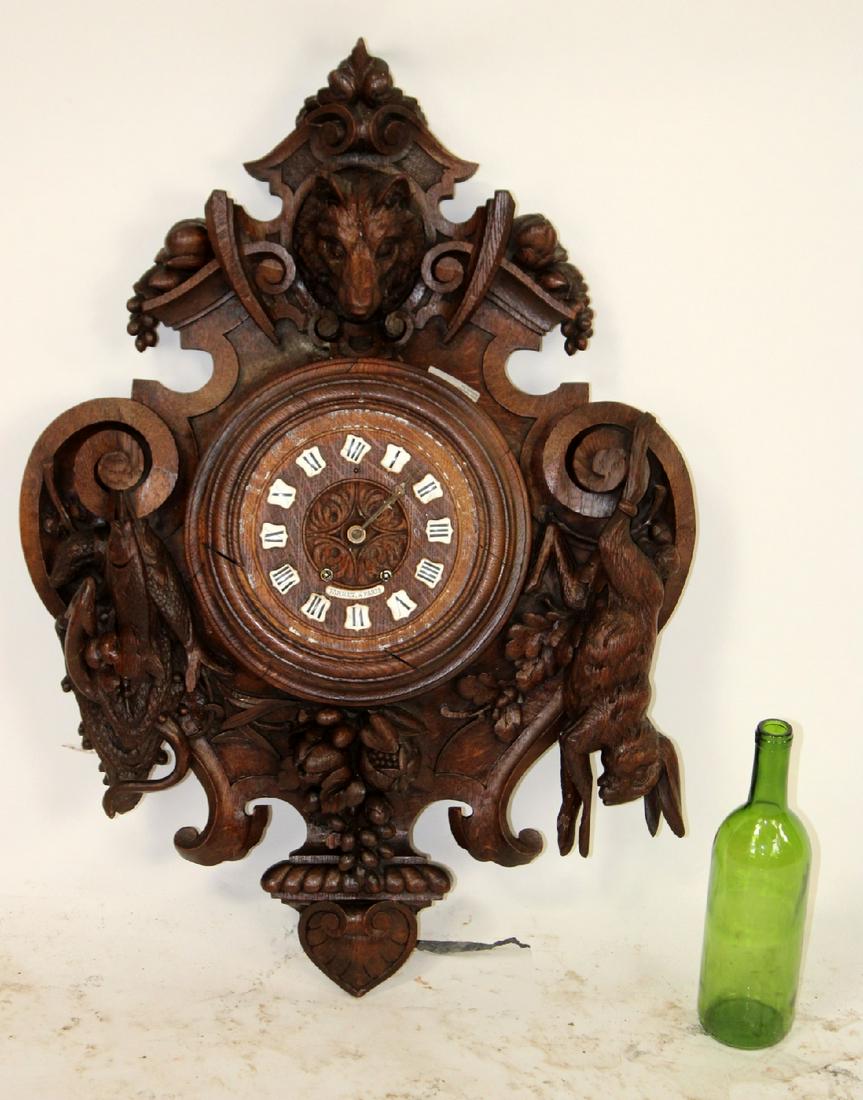 French wall clock in carved oak with game (1 of 11)