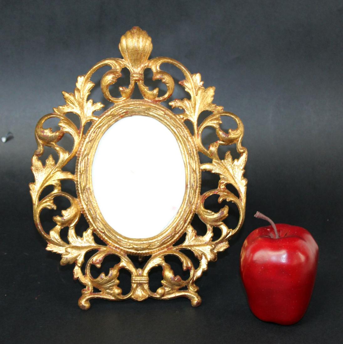 Gilt metal Rococo style frame: Gilt metal Rococo style frame. 8 1/2"h x 10 1/2"w