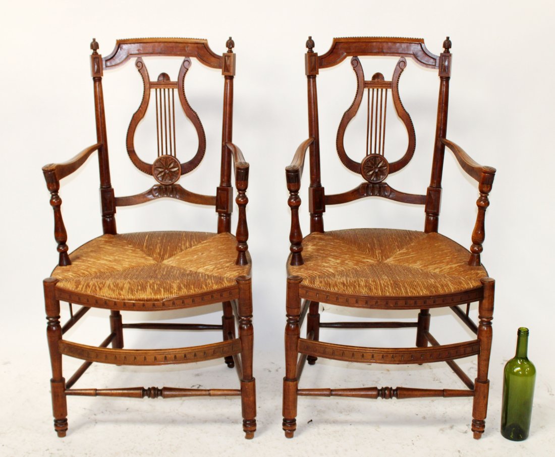 Pair of French walnut harp back armchairs: Pair of French walnut harp back armchairs with rush seats. 37 3/4"h x 20"w x 19 1/2"d