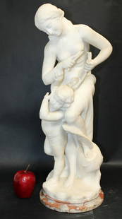 Italian Guglielmo Pugi white marble statue: Italian Guglielmo Pugi (1850-1915) carved white marble figural statue depicting Venus clipping Cupid's wings. Signed Pugi. Late 19th century. 25"h x 8 1/2" dia at the base