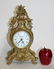 Louis XV style bronze mantel clock