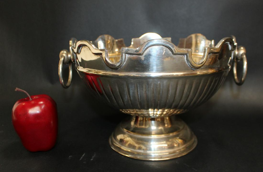 Silverplate scallop edge footed bowl: Silverplate scallop edge footed bowl with ring handles. Late 20th century. 7"h x 11" dia