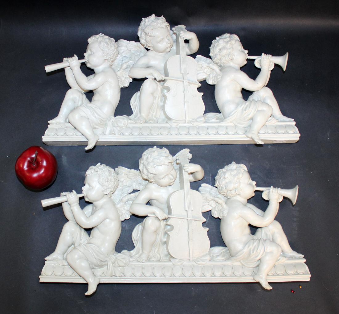Pair of cast resin musical cherub crests (1 of 4)