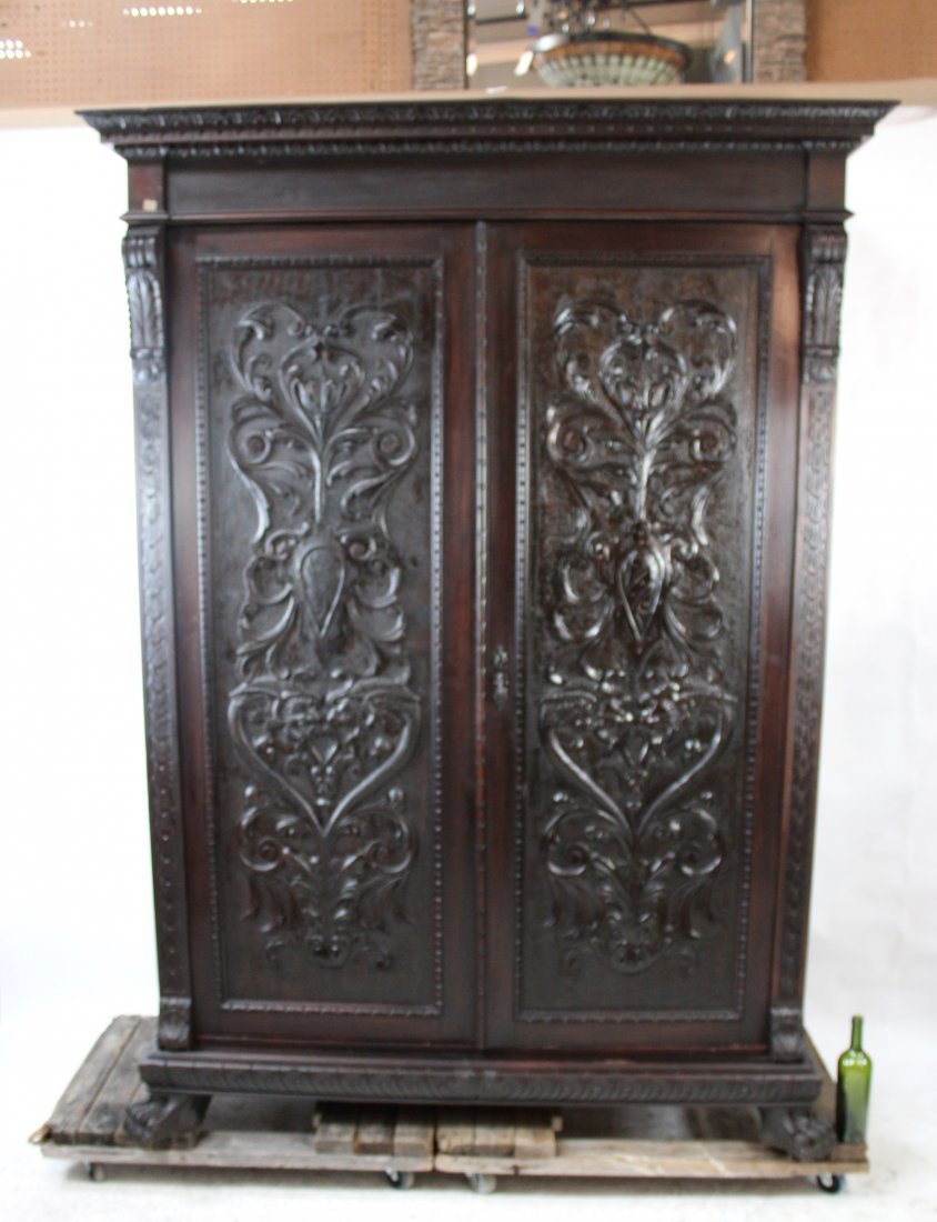 Italian Renaissance carved 2 door amoire: Italian Renaissance carved 2 door amoire. 87"h x 68"w x 28"d