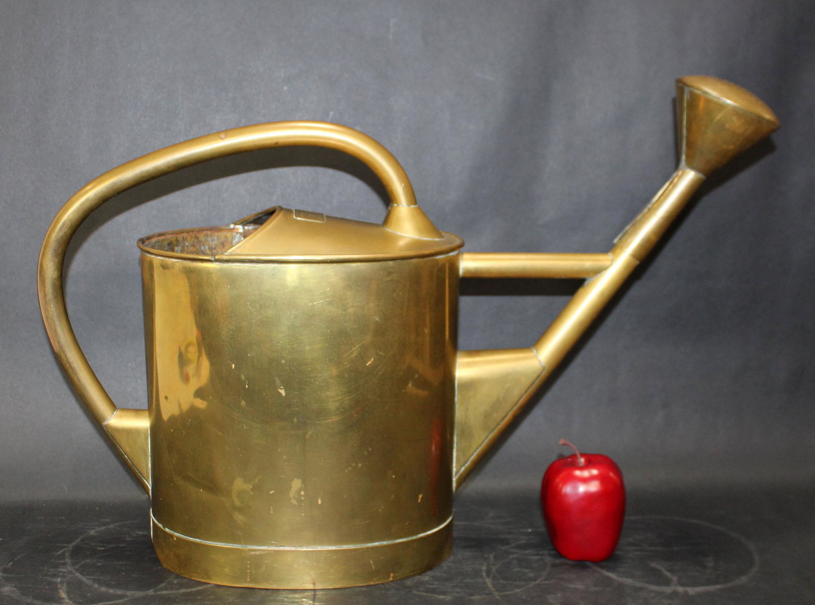 Antique Belgian brass watering can: Antique Belgian brass watering can. Made by Anciens Ateliers Santy, Gand, Belgium. Circa 1900. 17"h x 25"l x 7"w